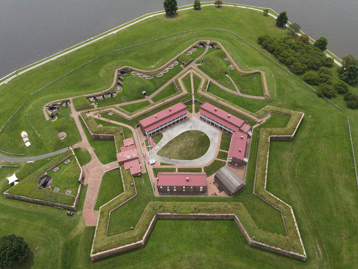 An aerial view of the star-shaped Fort McHenry, situated on a small peninsula at the entrance to Baltimore Harbor.