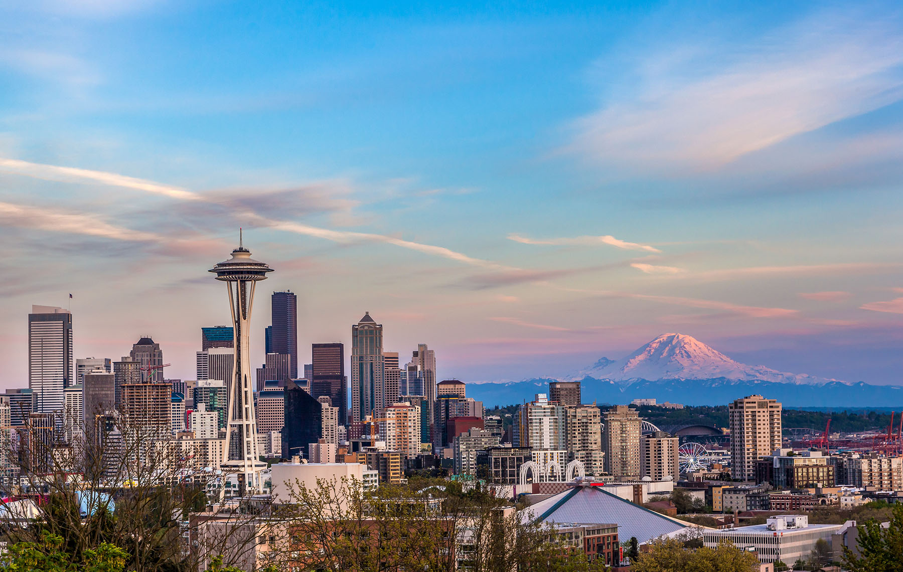 Seattle downtown skyline and Mt. Rainier at sunset.