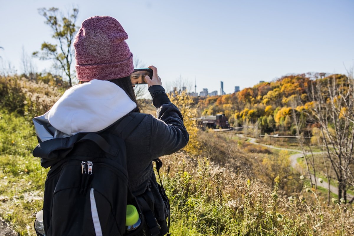 Young woman taking photo