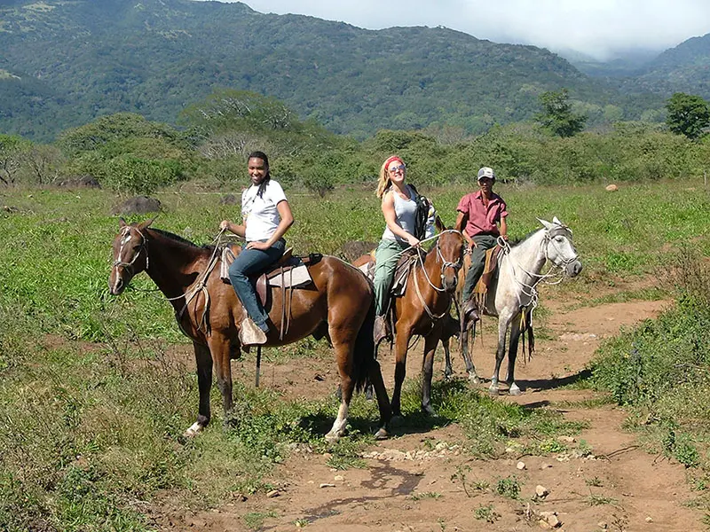Student horseback riding on educational trip