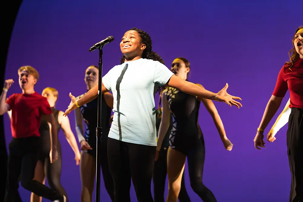 NextGen student performers on stage