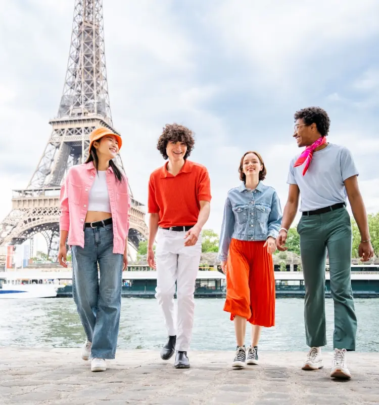 student tours of paris in front of the Eiffel Tower