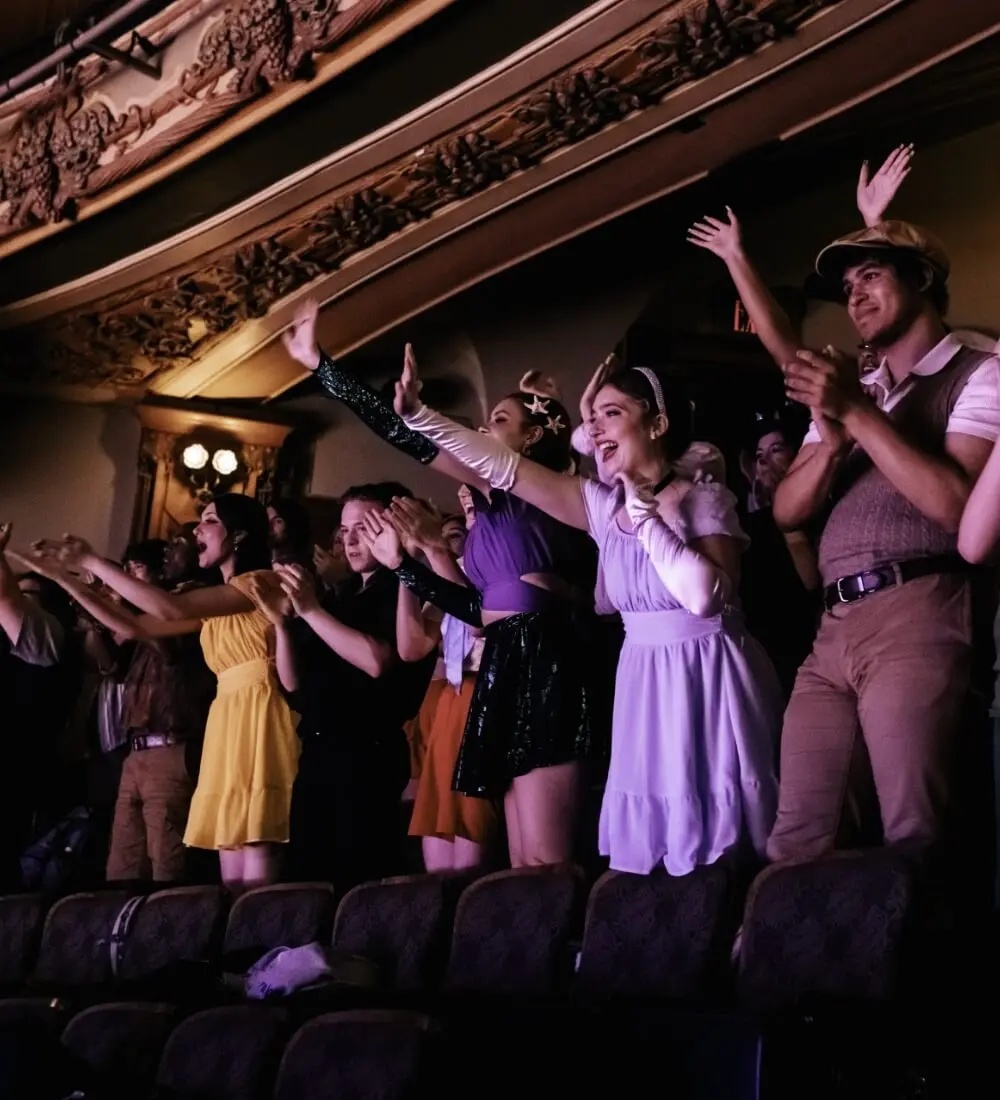 Students at a Broadway show on a school trip
