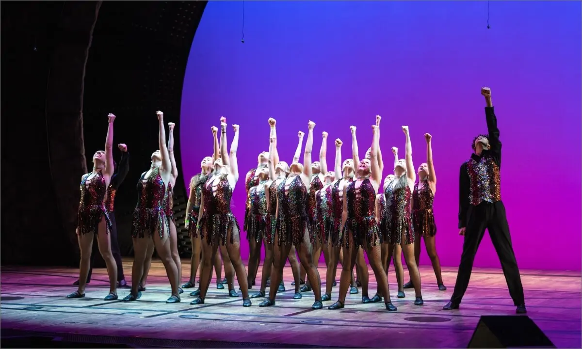Student on stage for a Broadway Theatre Tour Performance