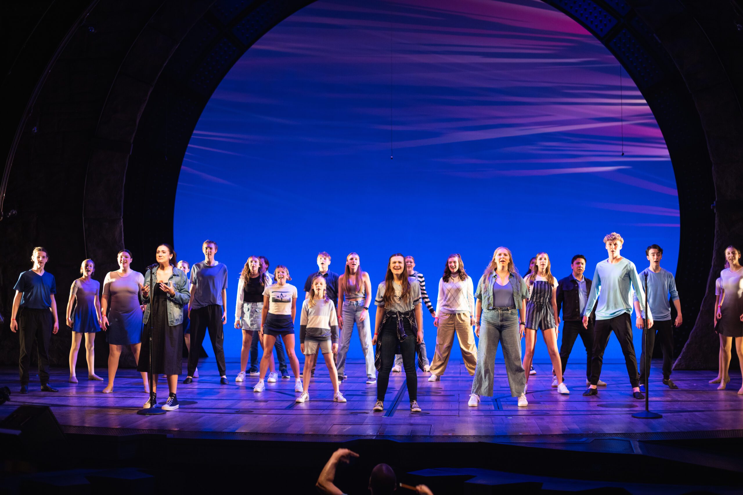 choir performance tour goup on stage