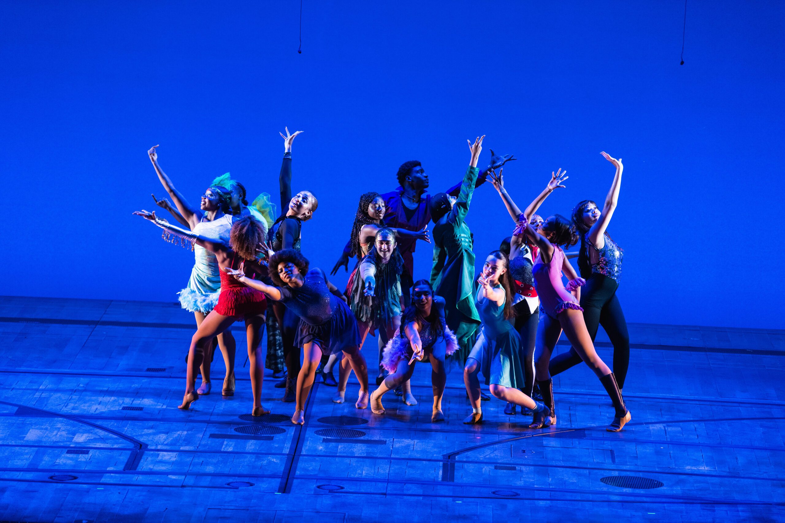 dance tour group on stage