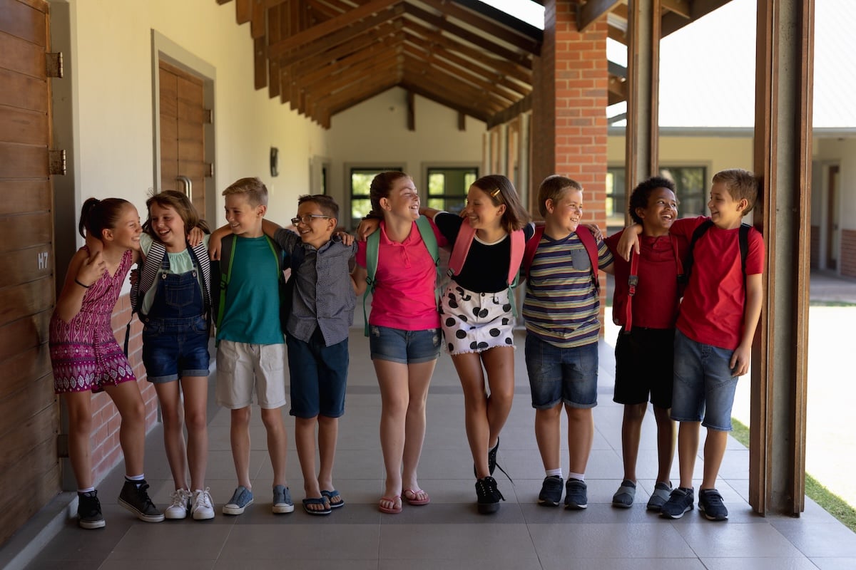 group-of-schoolchildren-walking-in-a-line-with-ar-2026-01-09-09-25-07-utc